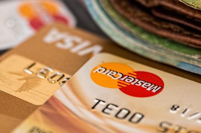 Close up of cards and money. Close up of cards and money.