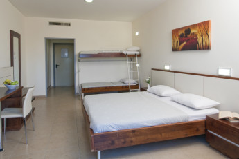 Tel - Hai : Family room in the Tel - Hai hostel in Israel