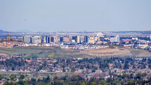 San Jose skyline and Silicon Valley real estate market with demand across nearby suburban communities