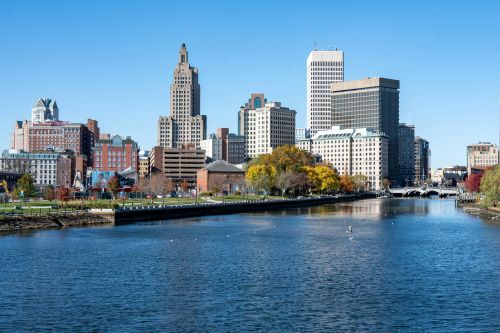 Rhode Island skyline and coastal New England real estate market with housing activity across statewide communities