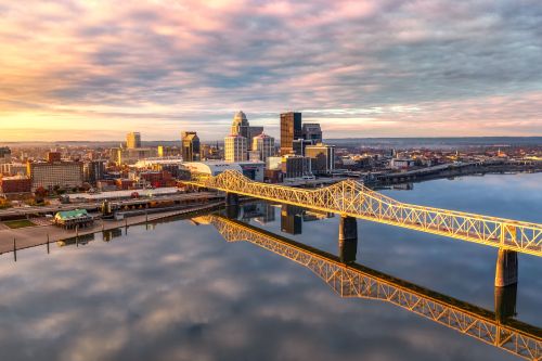 Louisville skyline and Kentucky real estate market with demand across nearby suburban communities