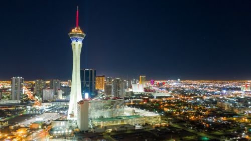 Nevada skyline and desert-state real estate market with housing activity across metro suburbs and regional communities
