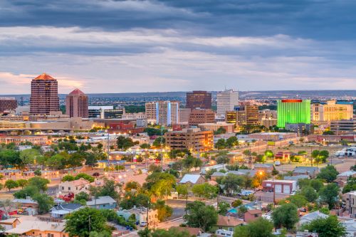 Albuquerque skyline and Southwest real estate market with housing activity across nearby communities