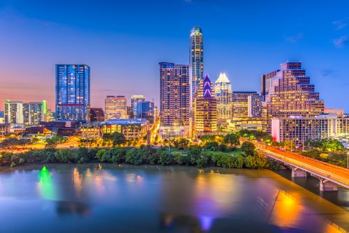 Austin skyline and Central Texas real estate market with housing activity across surrounding suburbs