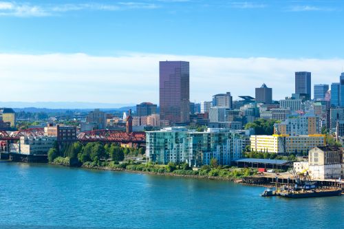 Portland skyline and Pacific Northwest real estate market with housing demand across nearby communities
