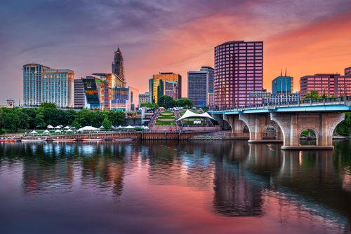 Connecticut skyline and regional real estate market with housing demand across coastal towns and inland communities
