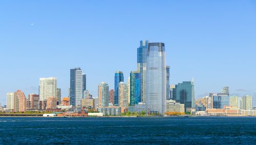 New Jersey skyline and regional real estate market spanning commuter suburbs and major metro communities