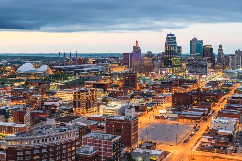 Kansas City skyline and Midwest real estate market with housing demand across nearby suburban communities