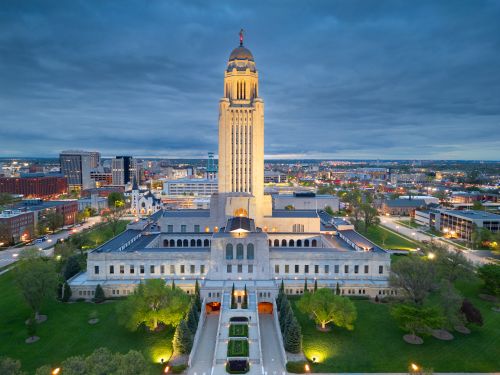 Nebraska skyline and statewide real estate market spanning Omaha suburbs and regional communities