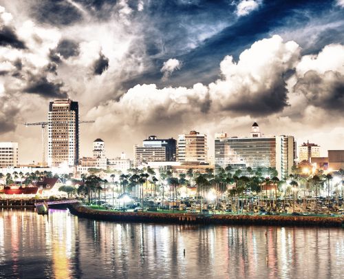 Long Beach skyline and coastal Southern California real estate market across surrounding communities