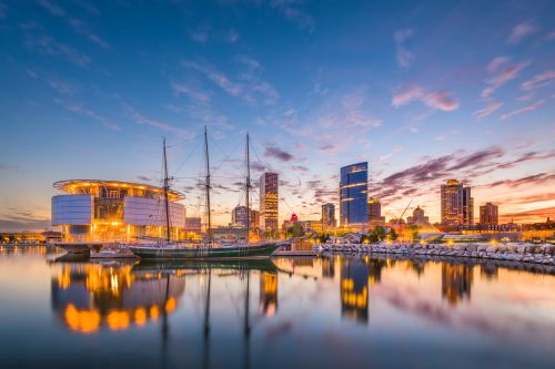 Milwaukee skyline and Wisconsin real estate market spanning city neighborhoods and nearby suburbs