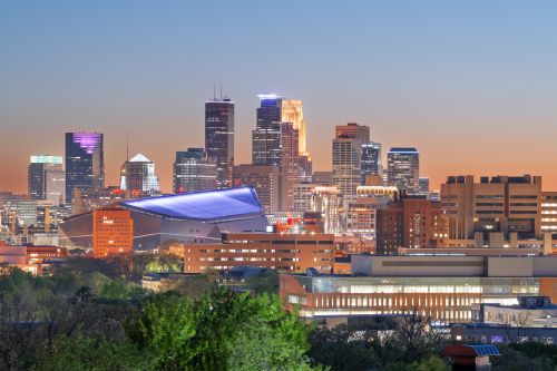 Minneapolis skyline and Upper Midwest real estate market spanning city neighborhoods and nearby suburbs
