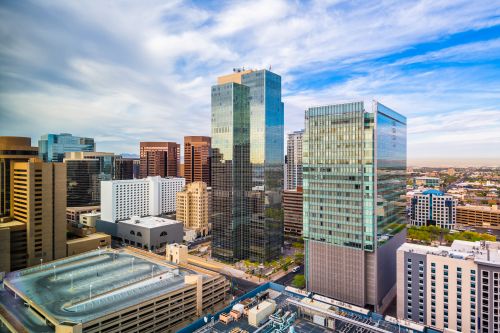 Arizona skyline and regional real estate market with housing demand across desert metros and suburban communities