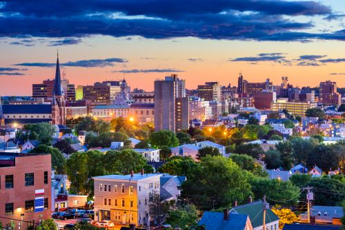 Maine skyline and coastal-state real estate market with housing activity across regional communities statewide
