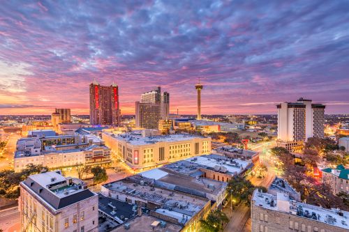 San Antonio skyline and South Texas real estate market spanning city neighborhoods and surrounding suburbs