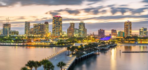 Florida skyline and statewide real estate market with housing activity across coastal metros and inland communities