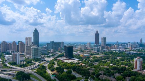 Georgia skyline and statewide real estate market spanning Atlanta suburbs and growing regional communities