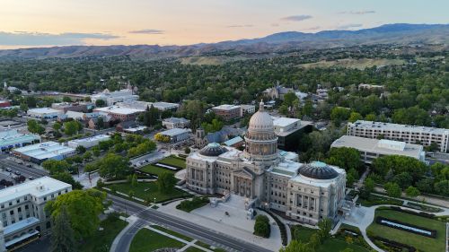 Idaho skyline and Mountain West real estate market with housing demand across growing suburbs and statewide communities
