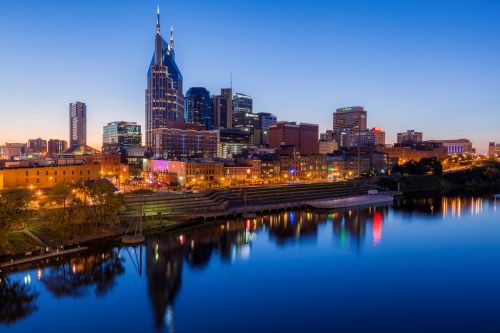 Tennessee skyline and regional real estate market with housing demand across growing metro suburbs and statewide communities