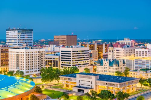 Arkansas skyline and statewide real estate market spanning growing suburbs and regional communities