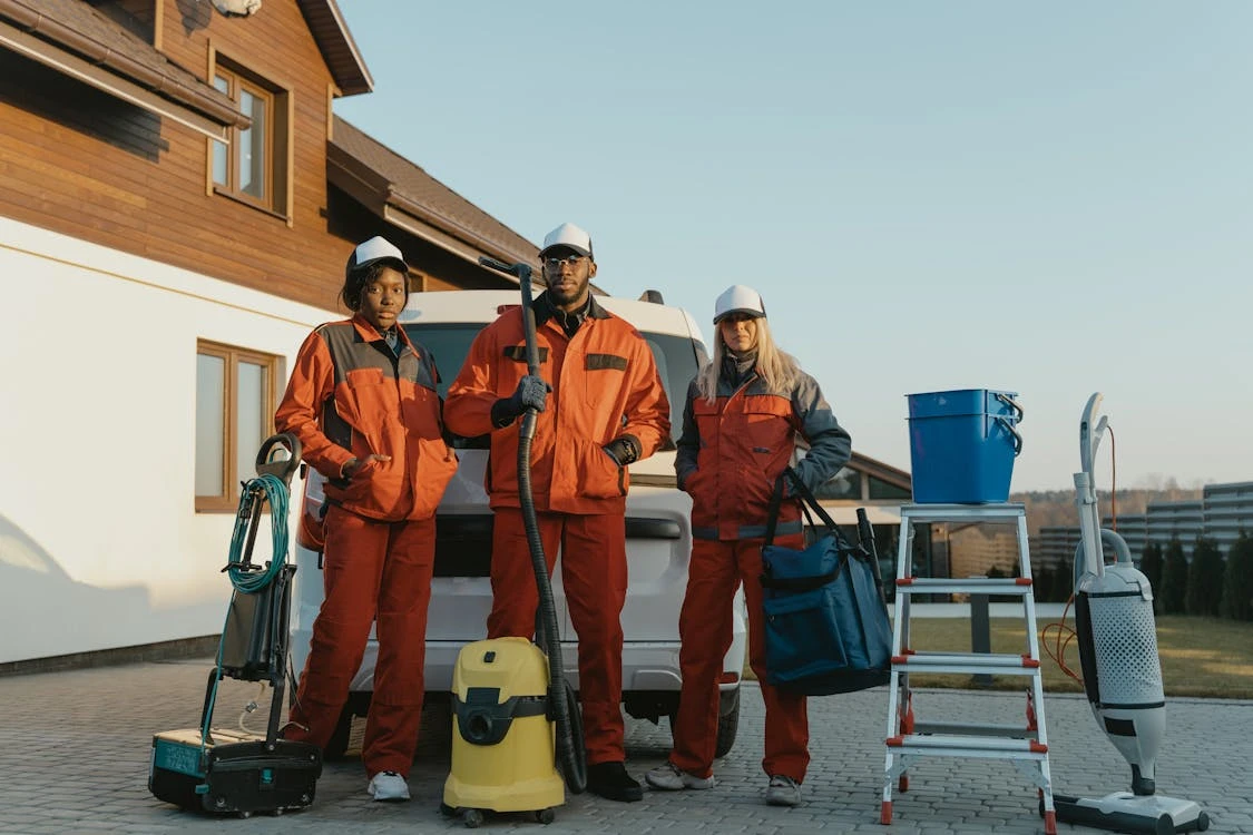 house cleaners standing