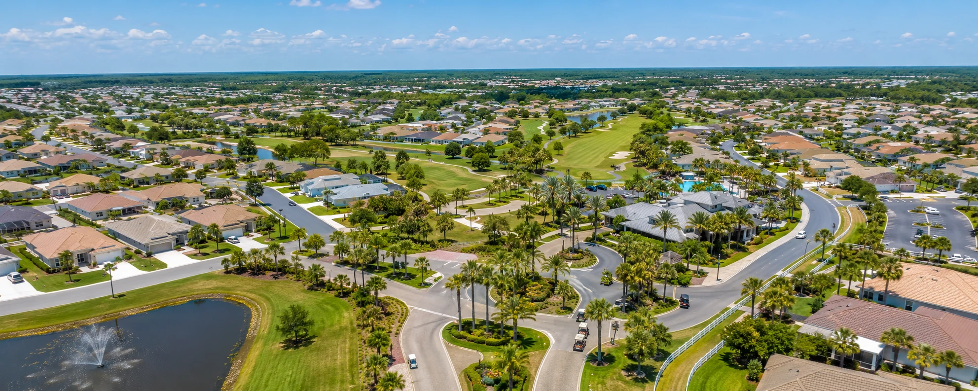 Aerial view of The Villages, Florida showing golf cart paths and age-restricted community neighborhoods