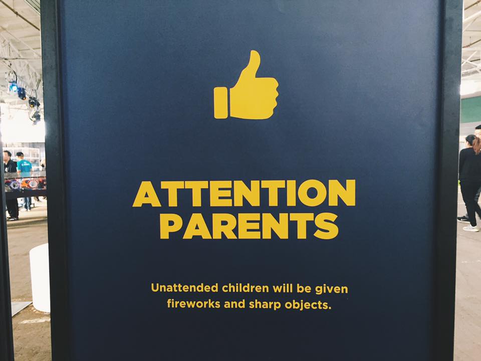 Sign saying: Attention parents unattented children will be given fireworks and sharp objects