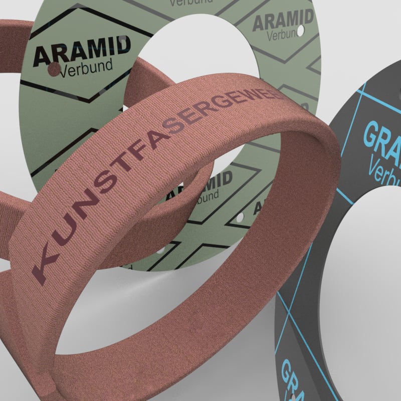Dieses Bild zeigt verschiedene Verbund- und Faserwerkstoffe, darunter Kunstfasergewebe, Aramidfasern und Graphitdichtungen
