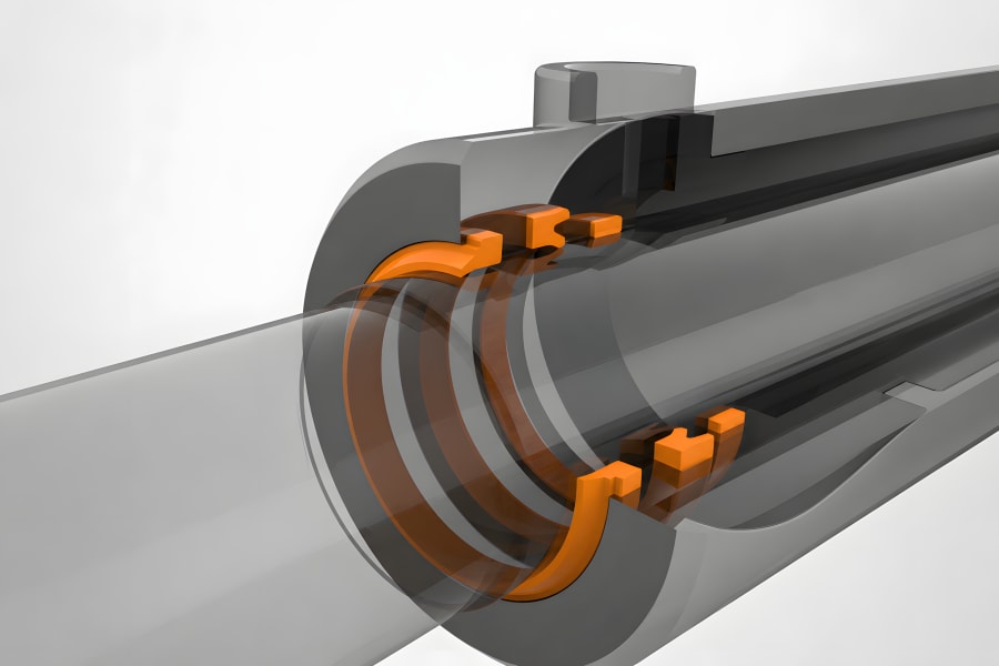 Querschnitt eines Hydraulikzylinders mit sichtbaren Dichtungselementen an Kolben und Kolbenstange sowie den abgedichteten Druckkammern.