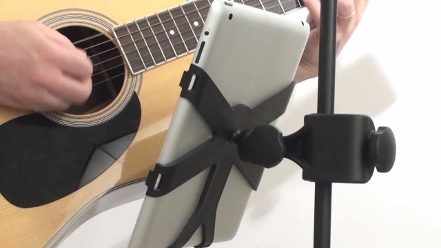 A musicians nowadays uses an iPad rather than traditional sheetpaper