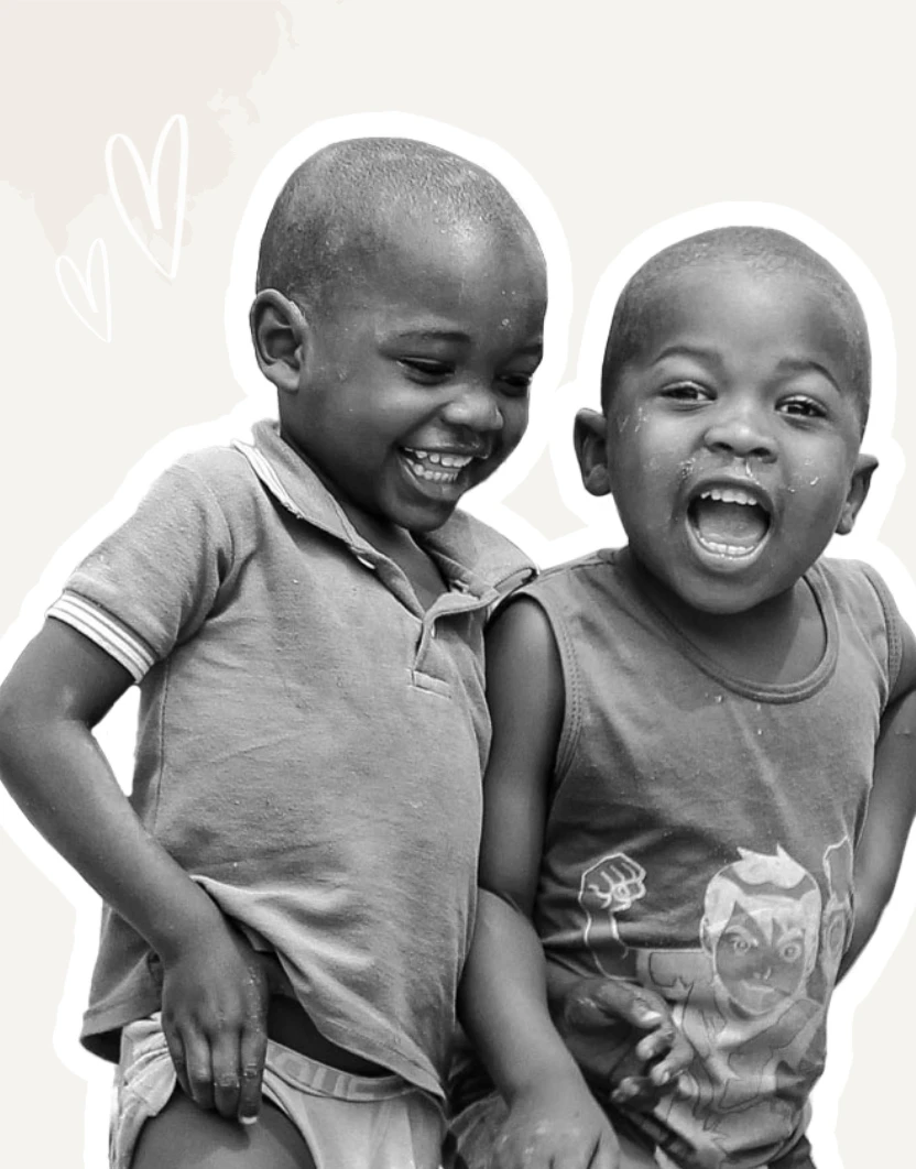 Two little boys smiling
