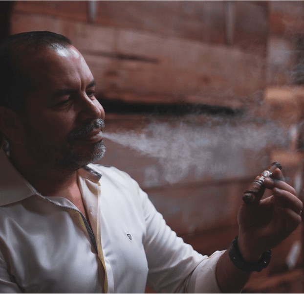 Man smoking an LGC cigar