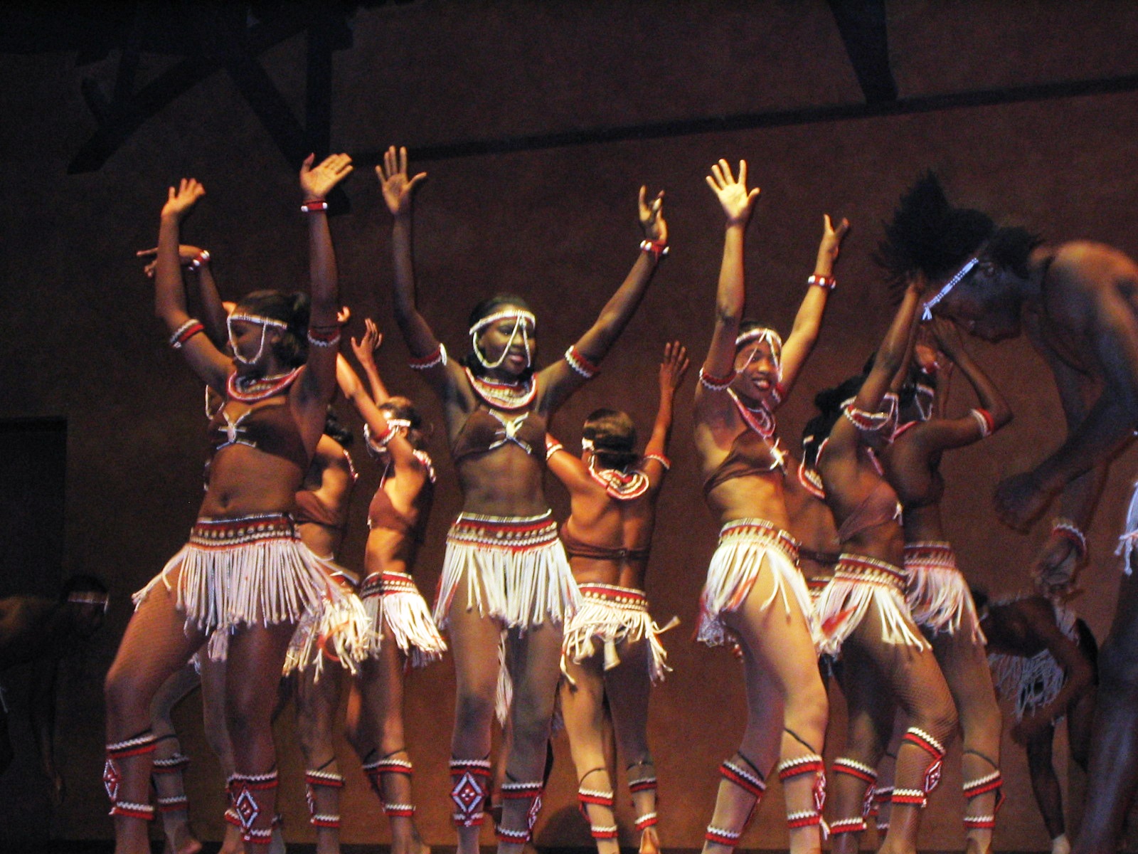 Colorful traditional dancers performing at Bomas of Kenya: A vibrant celebration of Kenya's diverse cultural heritage on a half-day tour"