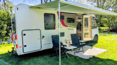 First Class**** – Bürstner with Air Conditioning, Queen Bed, Roadside Assistance Insurance