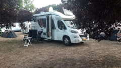 Luxurious, modern 4-person Bürstner with queen bed, pull-down bed and bicycle rack