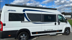 Stijn – Luxury Pössle Bus Camper from 2021 - Including 2 electric bicycles & air conditioning 