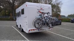 Roller Team 266 TL – Modern motorhome (2022) with luxurious queen-size bed and separate wellness area.