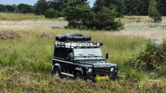 The Mail Man – Avontuurlijke Land Rover Defender 90 met nieuwe daktent en luifel