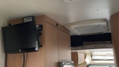 Semi-Integrated Camper for 4 people.