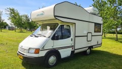 4 person 2.5l Ford transit alcove camper, completely renovated!