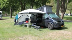 nice VW T6 Multivan with wide bed, pop-up roof, automatic