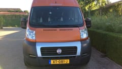 Compacte Buscamper – Dutch orange