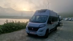 Off-grid campervan with lift-up bed, large garage 2024