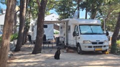 Bürstner Family Camper 4 persons, with bicycle carrier.
