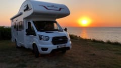 Roller Team Kronos M277 – 4 person camper with large alcove, 2 bed and bunk bed
