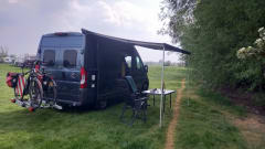 2p Fiat Ducato camper bus from 2016 with air conditioning and e-bike carrier