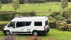  Off-grid bus camper from 2025 with length beds.