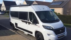 Experience the freedom of a compact bus camper