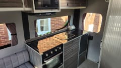 Lizzy – Sleeps 2 and has a loo, the tardis of campers
