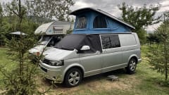 Iona – LWB 4 Berth VW Transporter with 'king size' bed & pop top